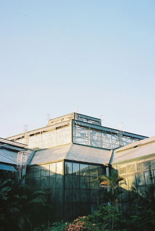 a large building with glass doors in the middle