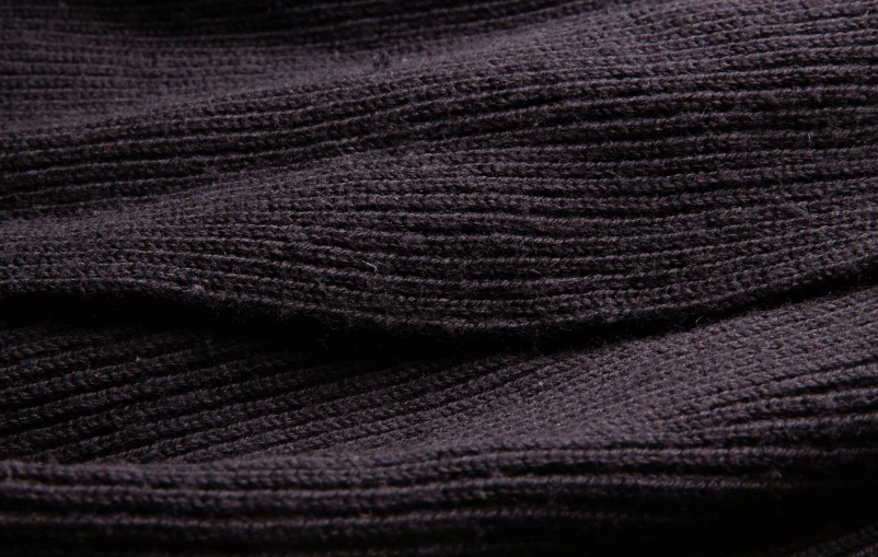 this is close up picture of a black colored texture