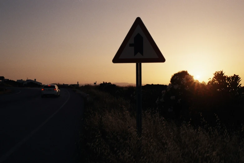 a sign that reads caution for crossing on a highway