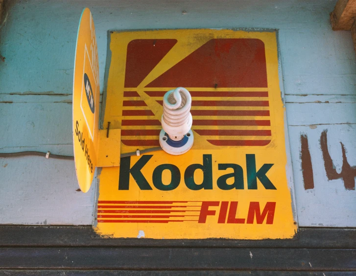 the kodak sign has been placed on a building