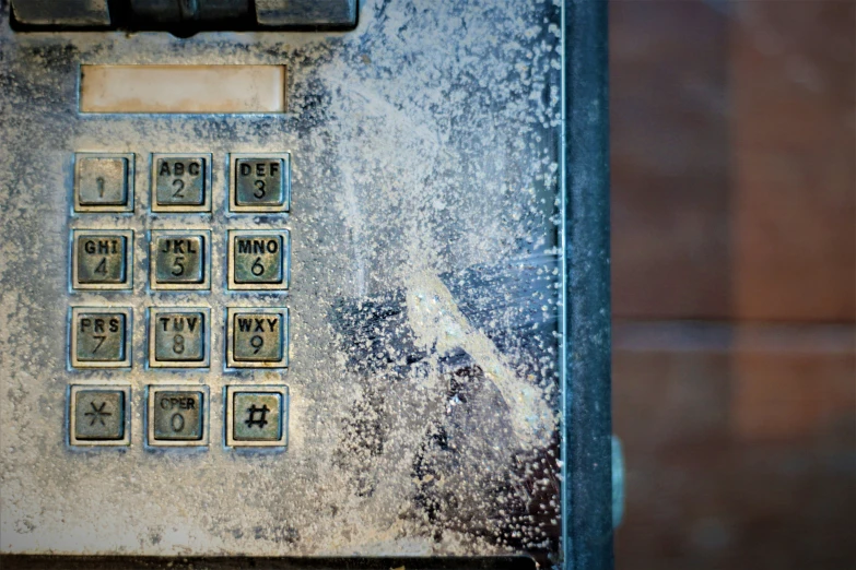 the number two on the front of an old pay phone