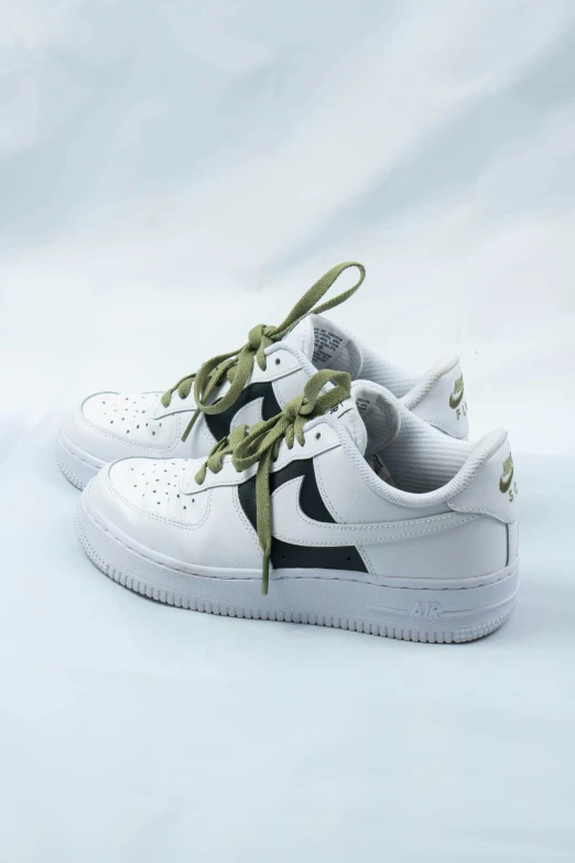 the white and black air force sneaker is made from poly