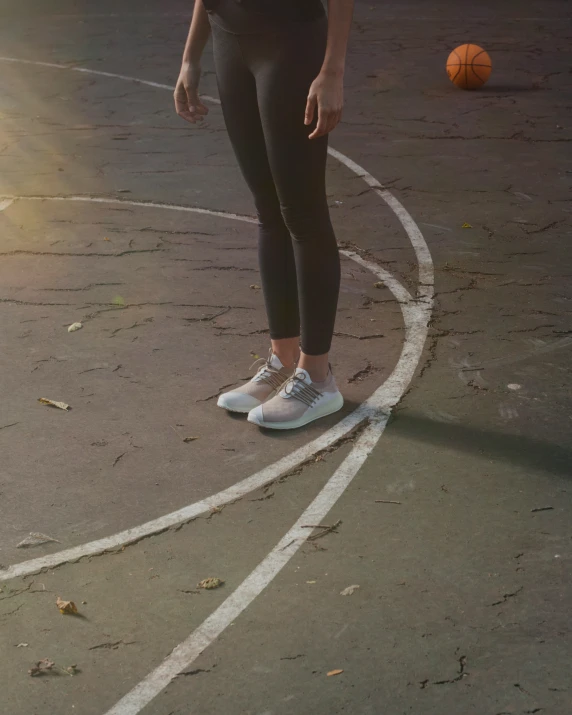 a person is on the court with a ball