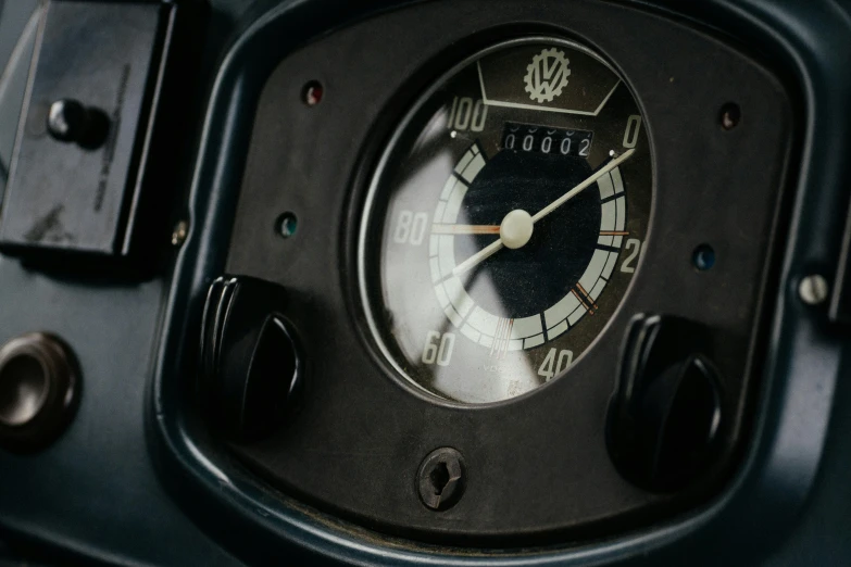 the front of a black and silver meter