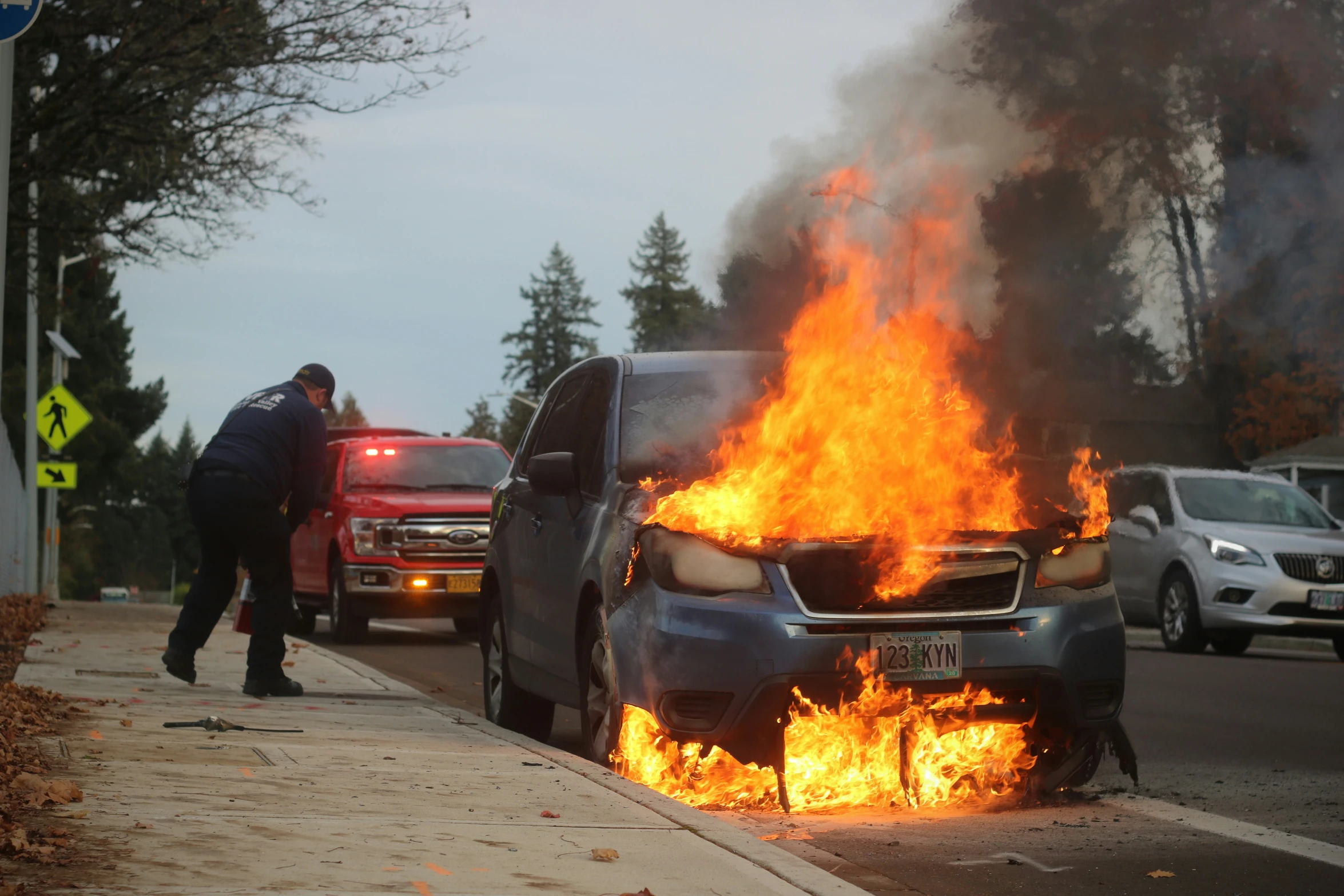 the car was being hit by the fire on the street