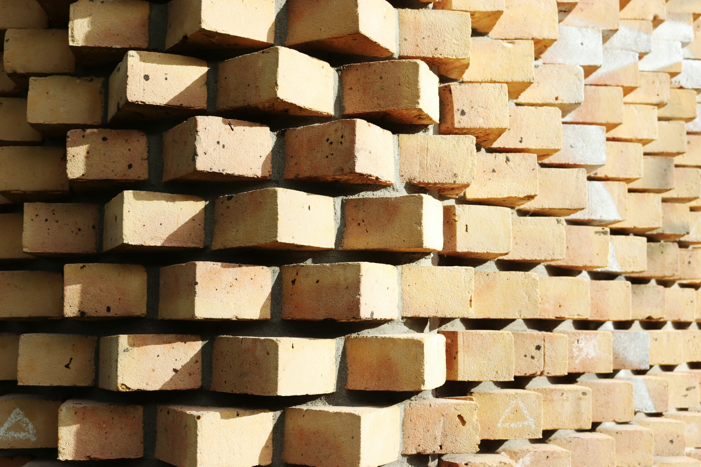 bricks stacked together in a square pattern for display