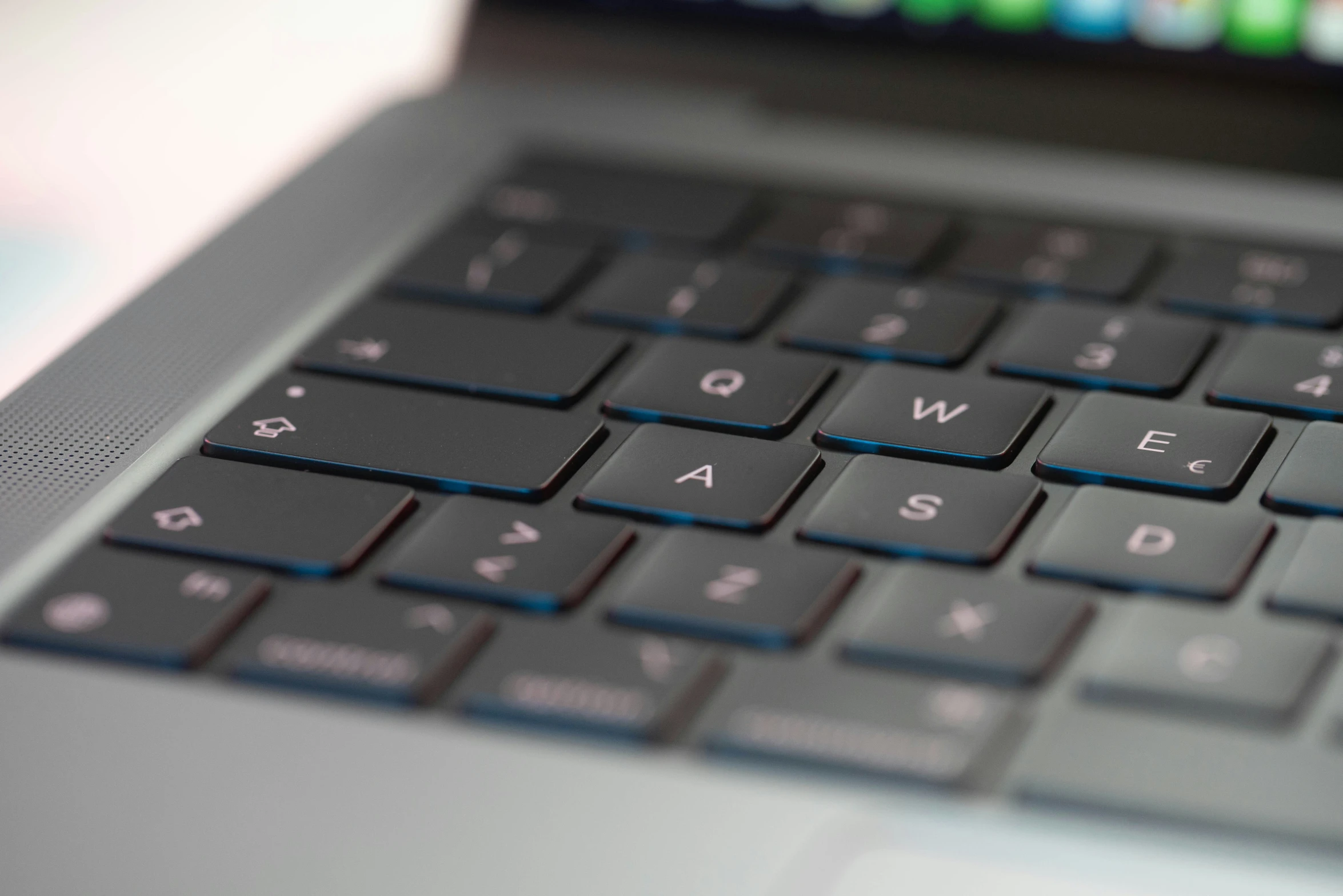 a close up s of the keyboard of an open laptop