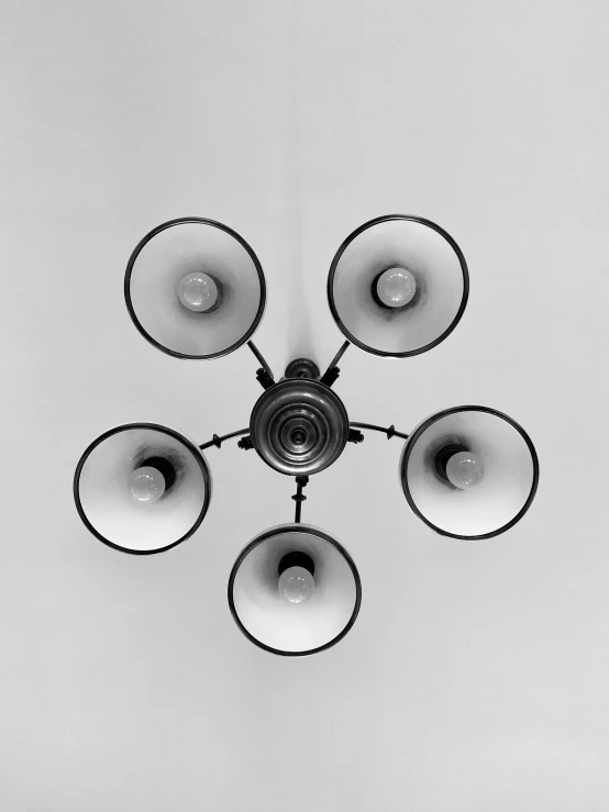 an overhead view of a chandelier in the ceiling