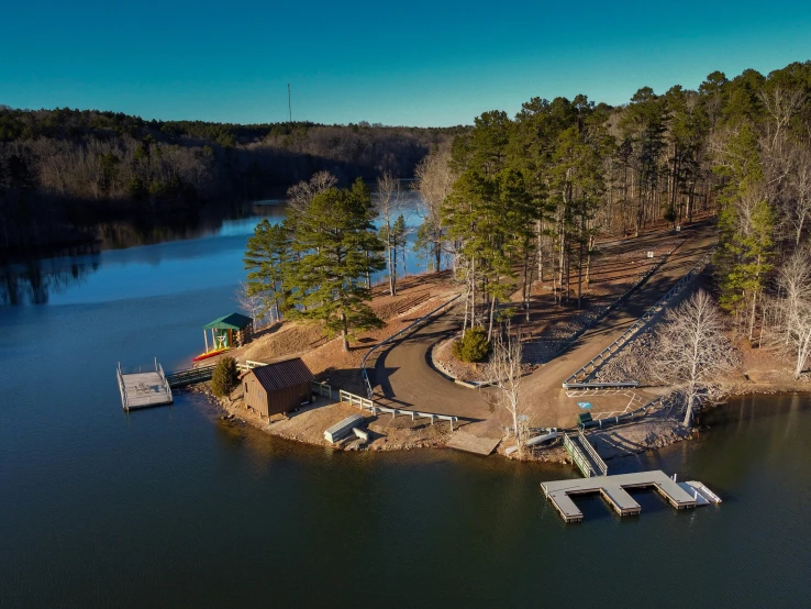 a view of a pond from the air of an island with steps on it