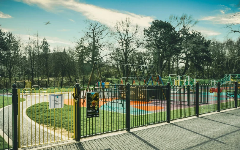 a children's play area with a multicolored basketball court