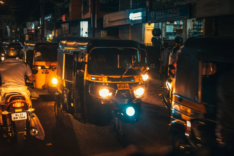 some traffic on the street at night time