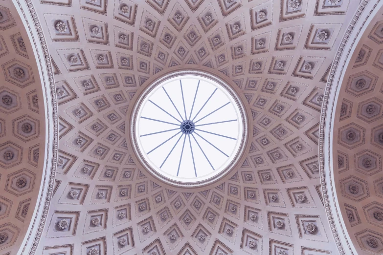 inside a dome, looking up at a circular object