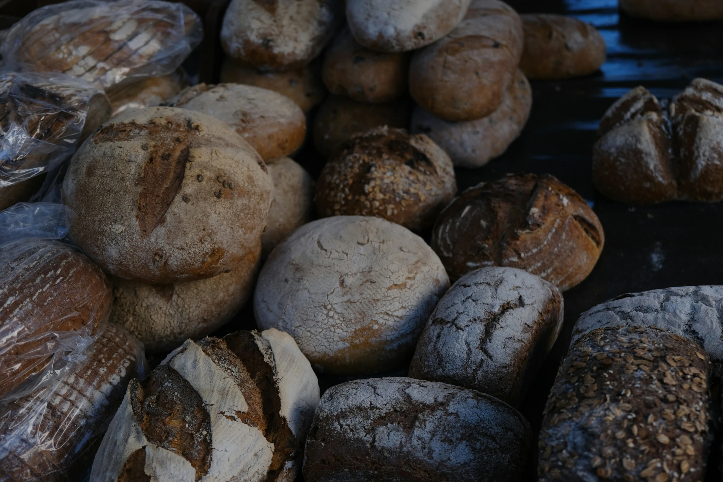 loaves of bread sitting in the sun