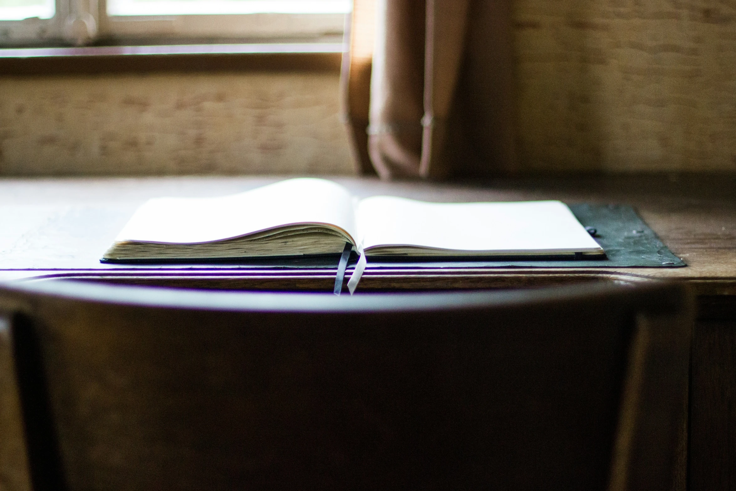 a book is open on top of a table