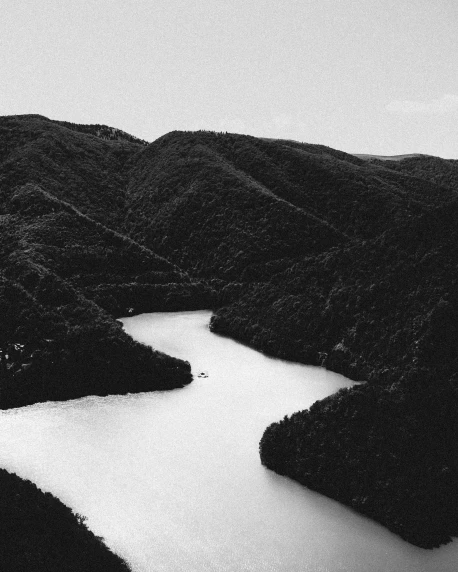 black and white po of a river in a valley