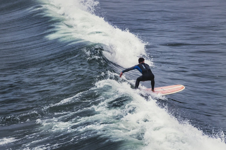 a surfer is riding a wave in the ocean