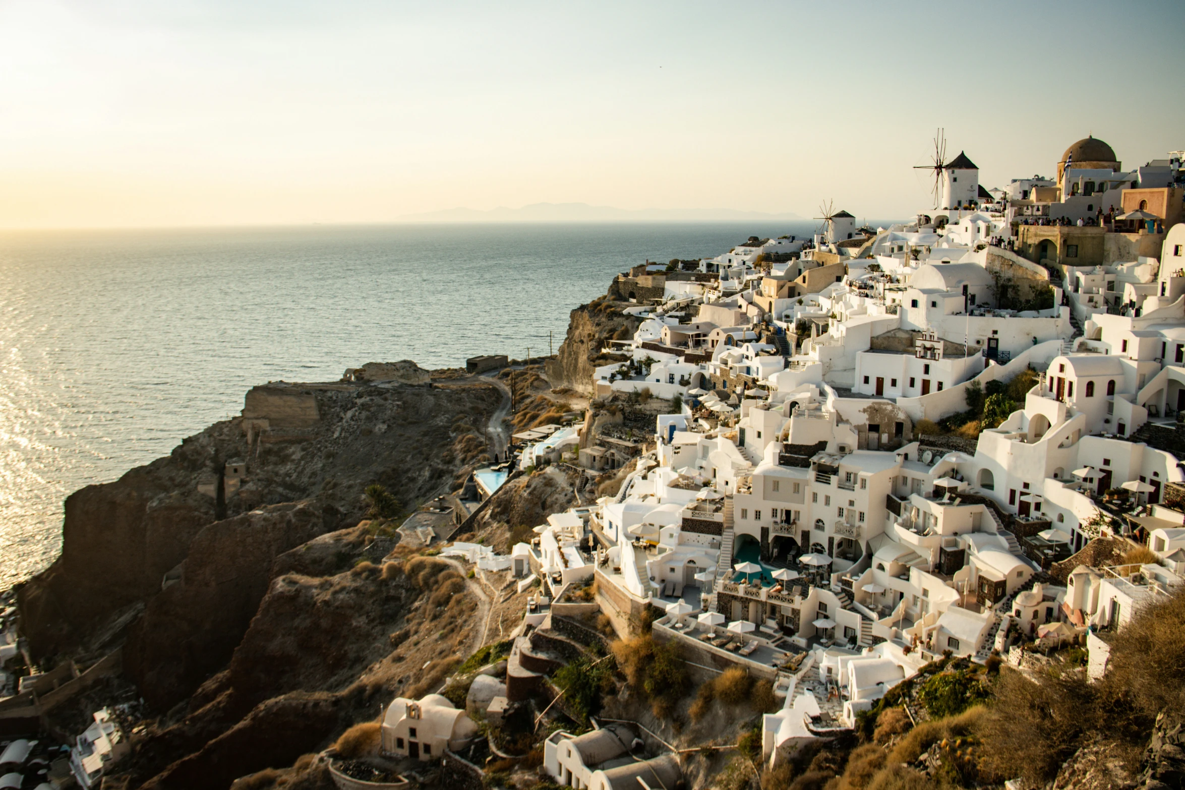 the coast line with some houses on top