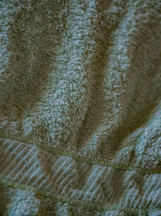 the pattern of a green towel on a white background