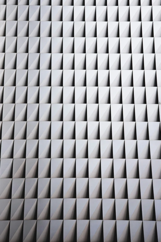 the diagonal pattern of a concrete building