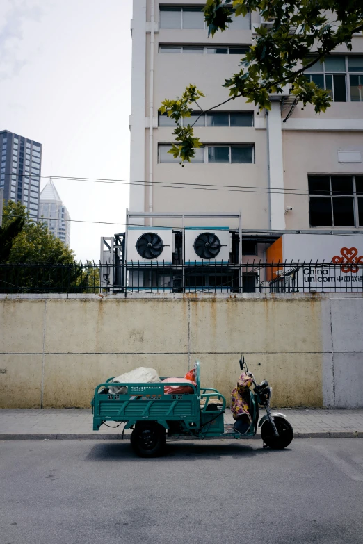 a large flatbed truck parked along the side of a road