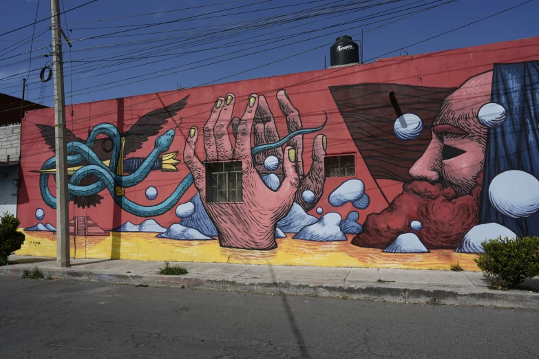 a multi - colored painted wall with various items surrounding