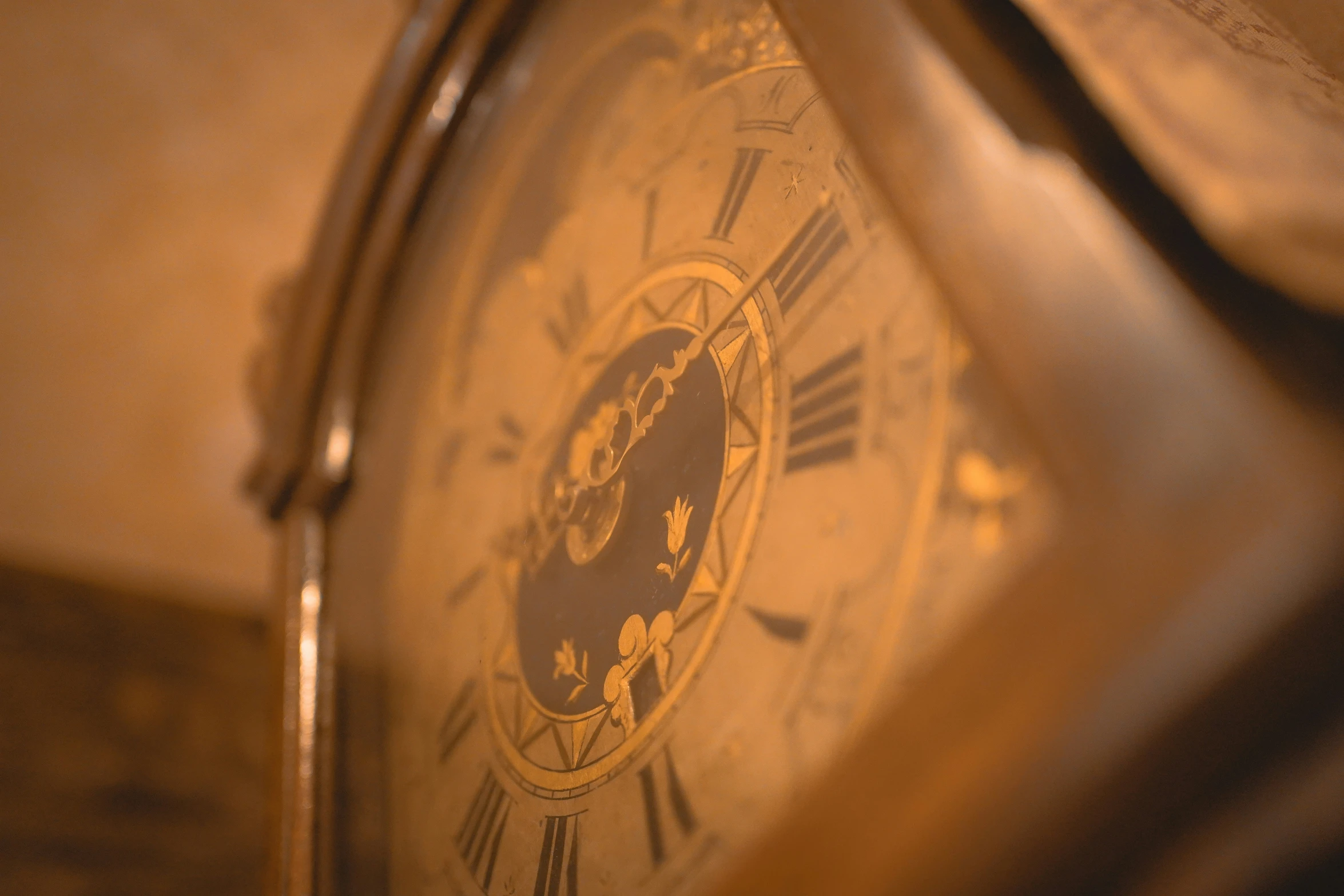 an old metal grandfather clock with roman numerals