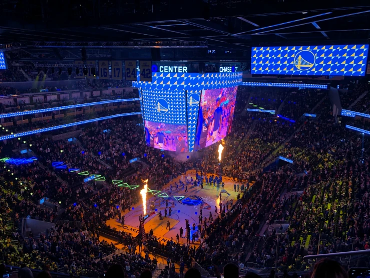 there is a basketball game projected on the screen