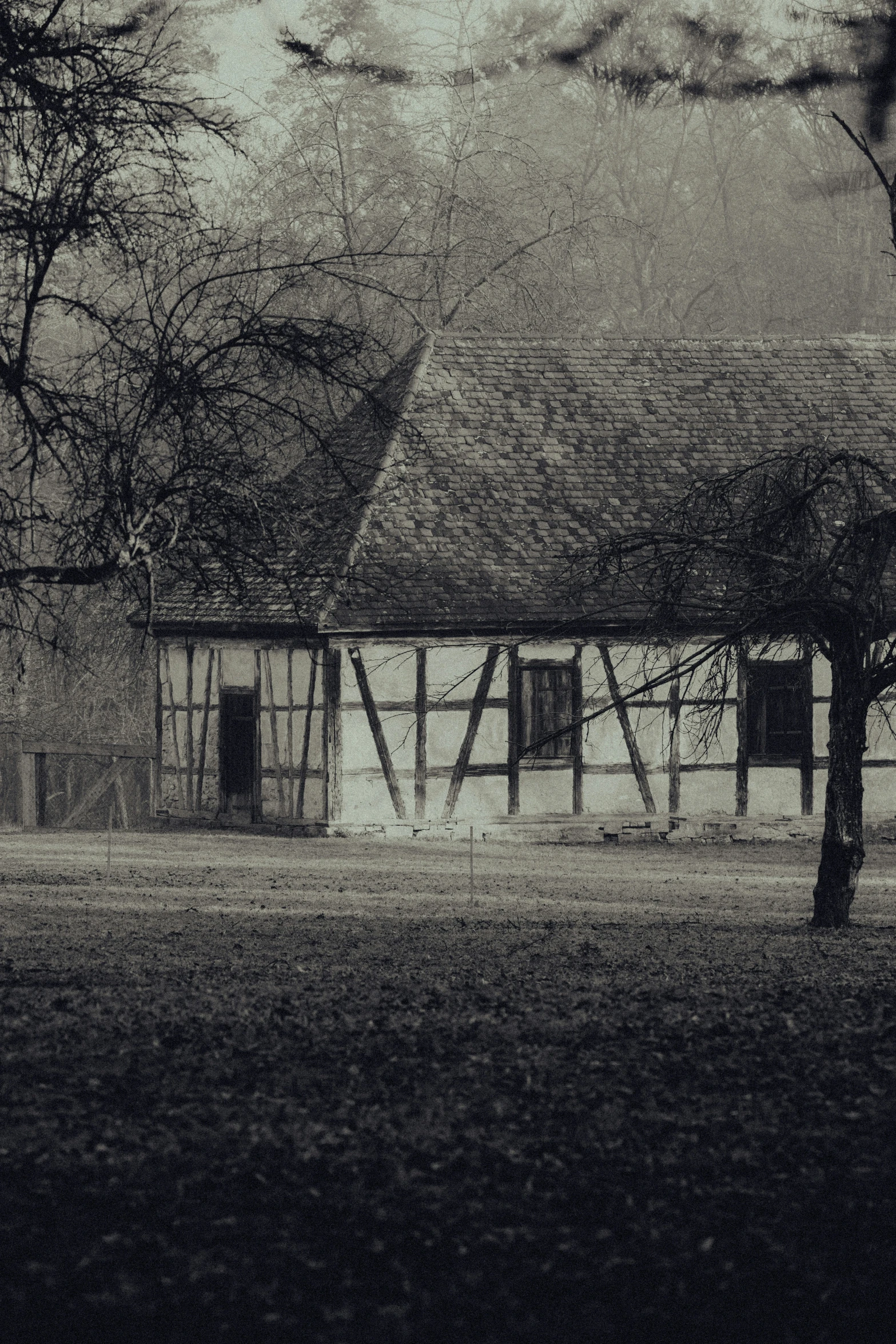 a black and white pograph of an old building