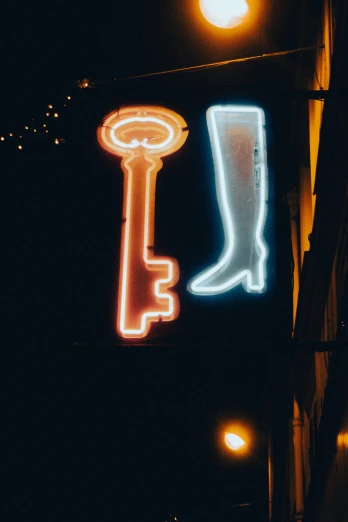a lighted sign with lights on the side of it