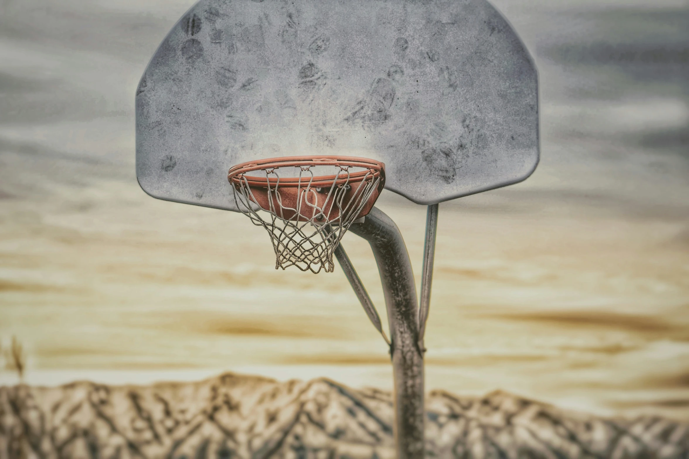 a drawing of a basketball going into a hoop