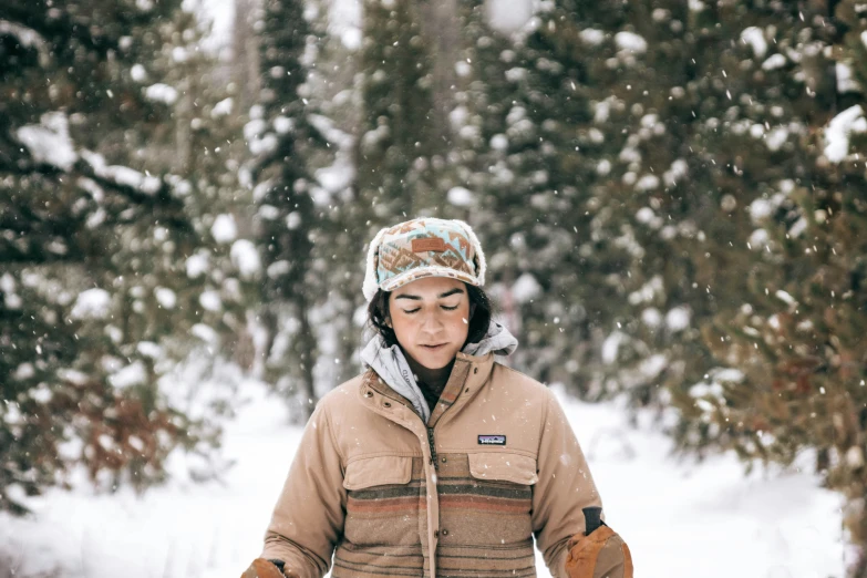  outside in snow with skis and poles