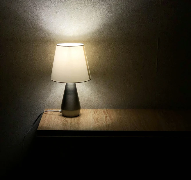 a lamp sitting on top of a table