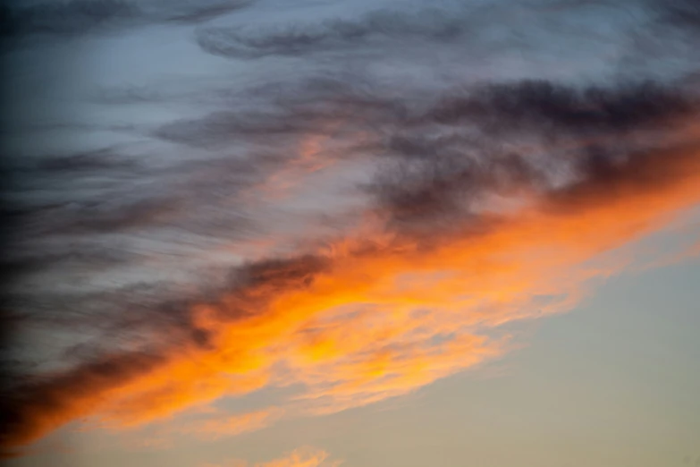 a po of some orange clouds in the evening