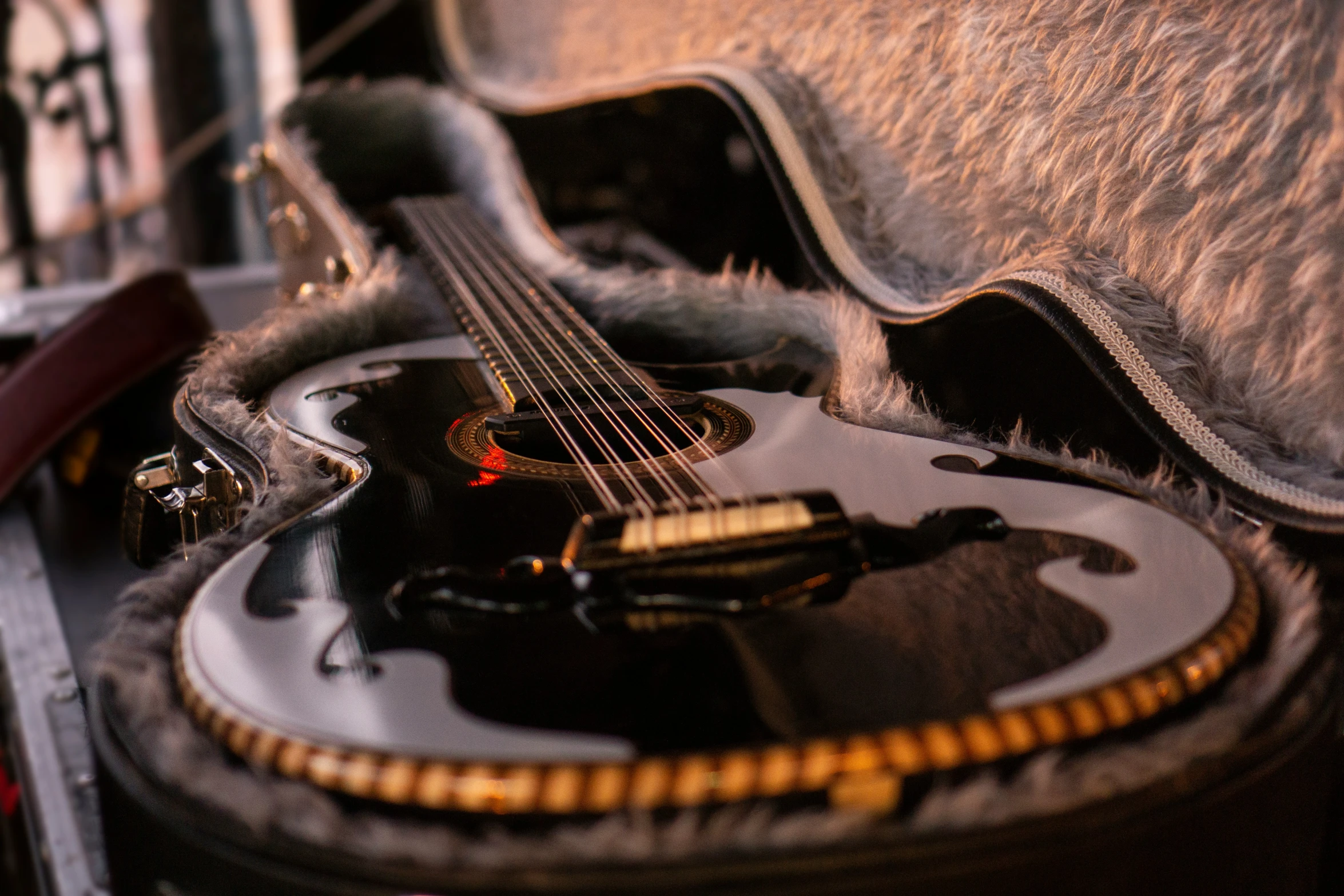 a very cool guitar on display on the floor