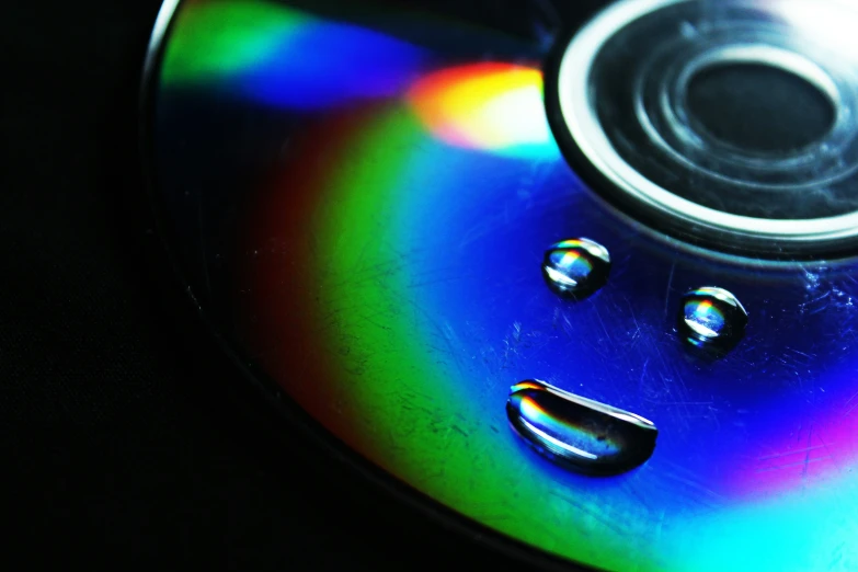 the disc is on its side on a black background