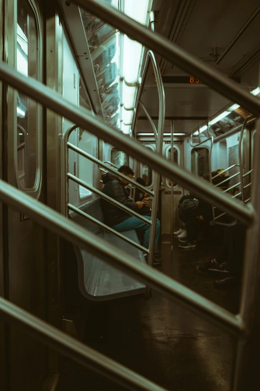 a man is sitting in a train chair on the seat