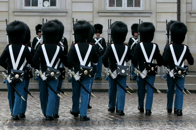 a group of men dressed in uniform