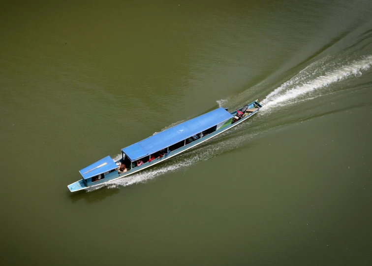 the bus boat is headed towards the right