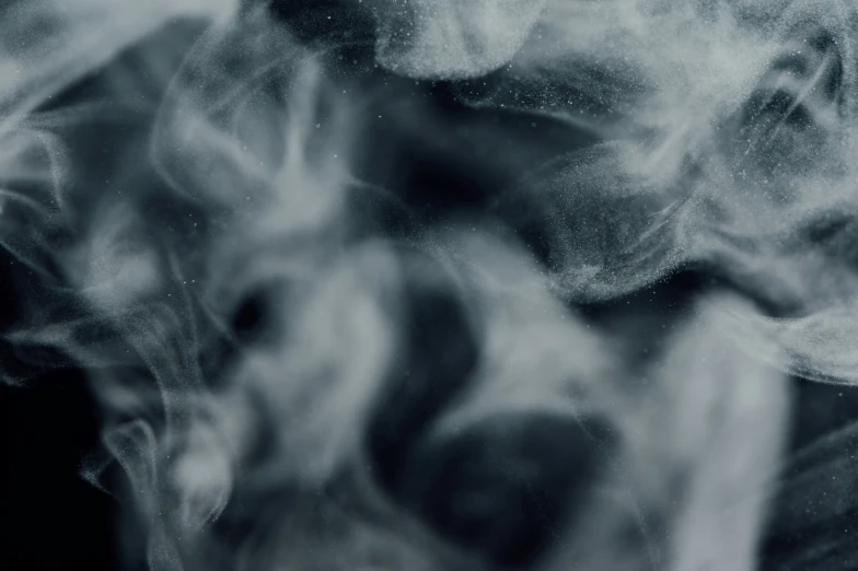 a picture of smoke on a black and white background