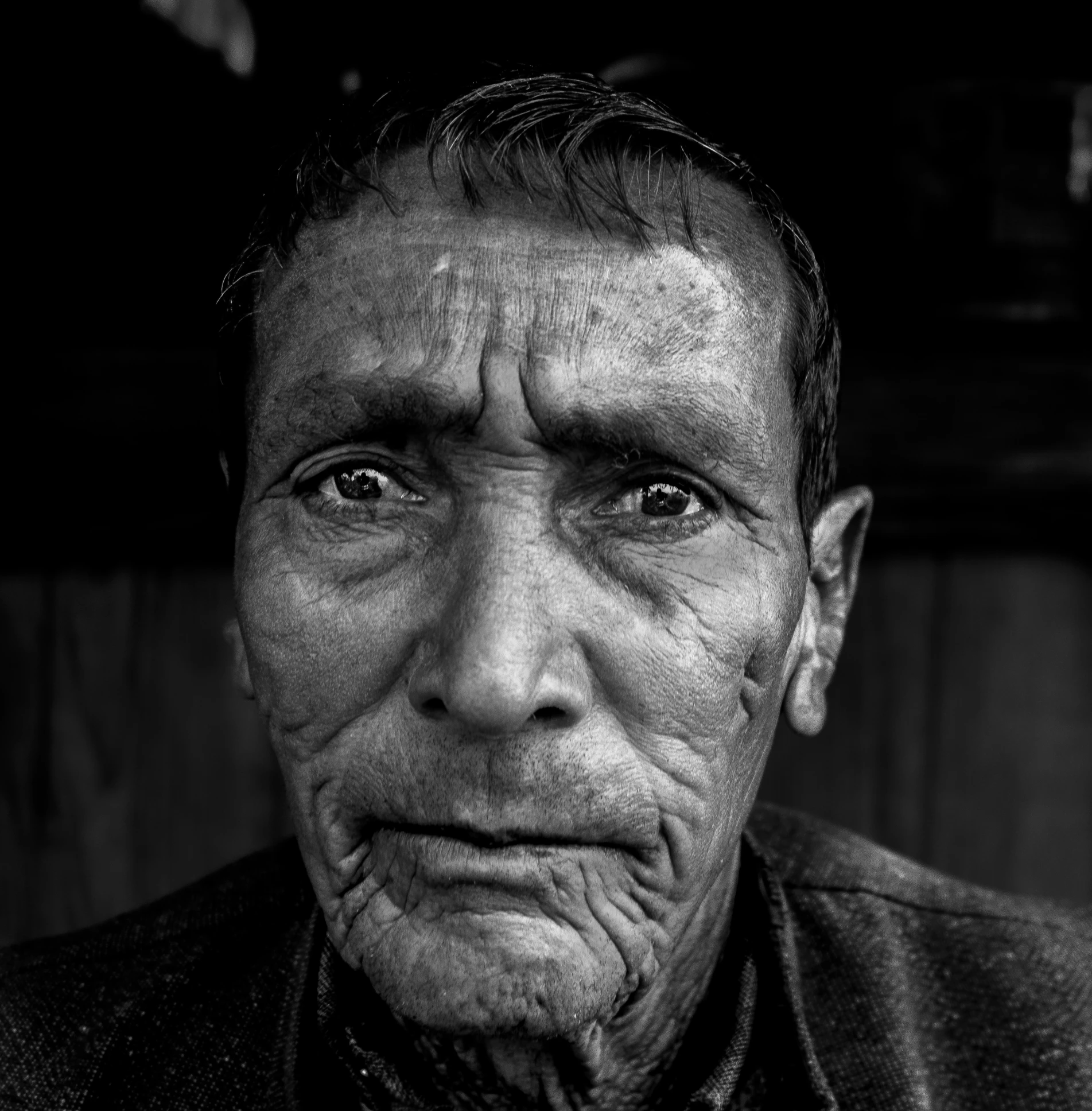 a black and white po of an elderly man