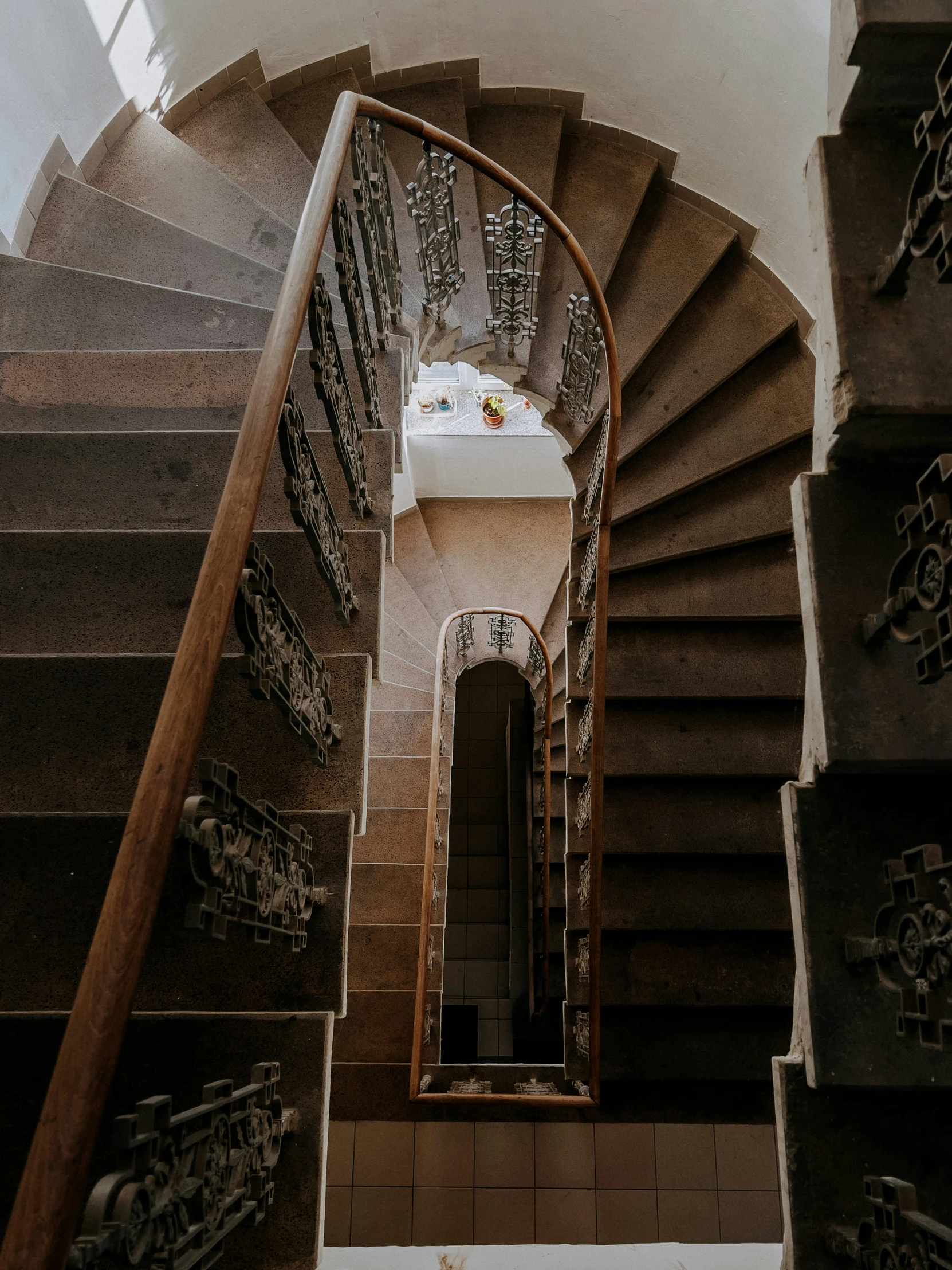 an staircase with lots of intricate carvings next to stairs