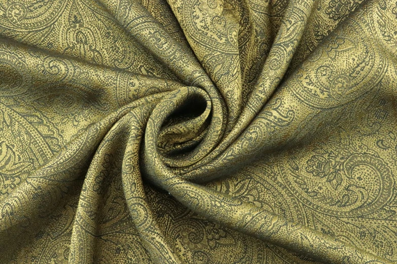 a metallic gold fabric with an intricate pattern