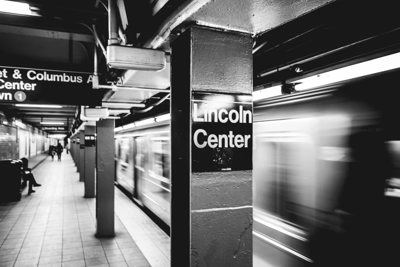 a black and white po of the inside of an amtrak terminal