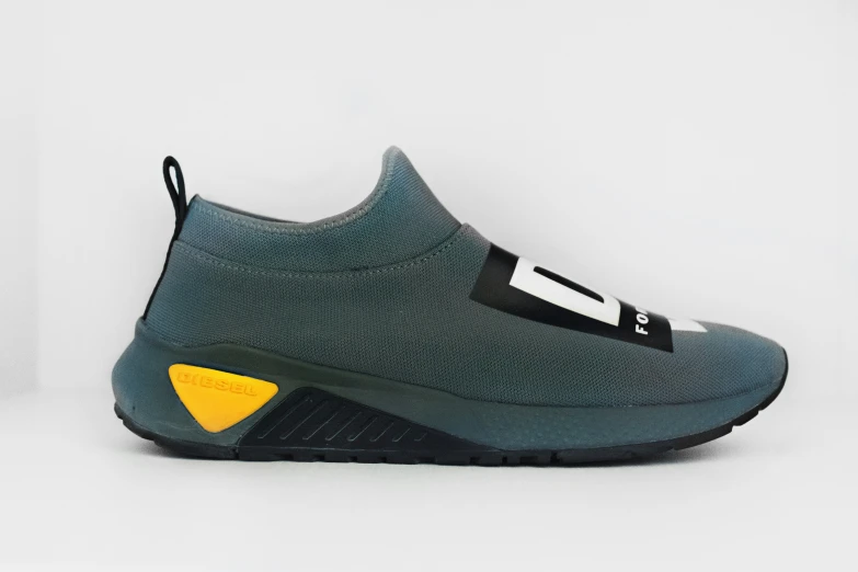 nike is adding a green and yellow slip - on to its socks