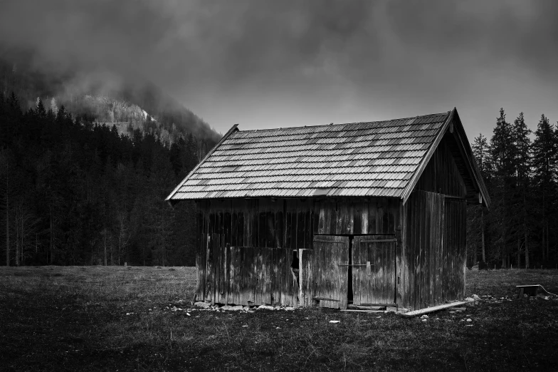 black and white po of an old barn