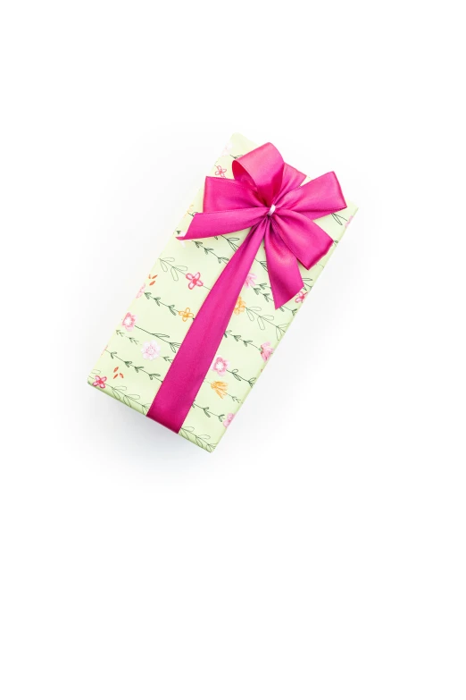 a small green box with a pink ribbon