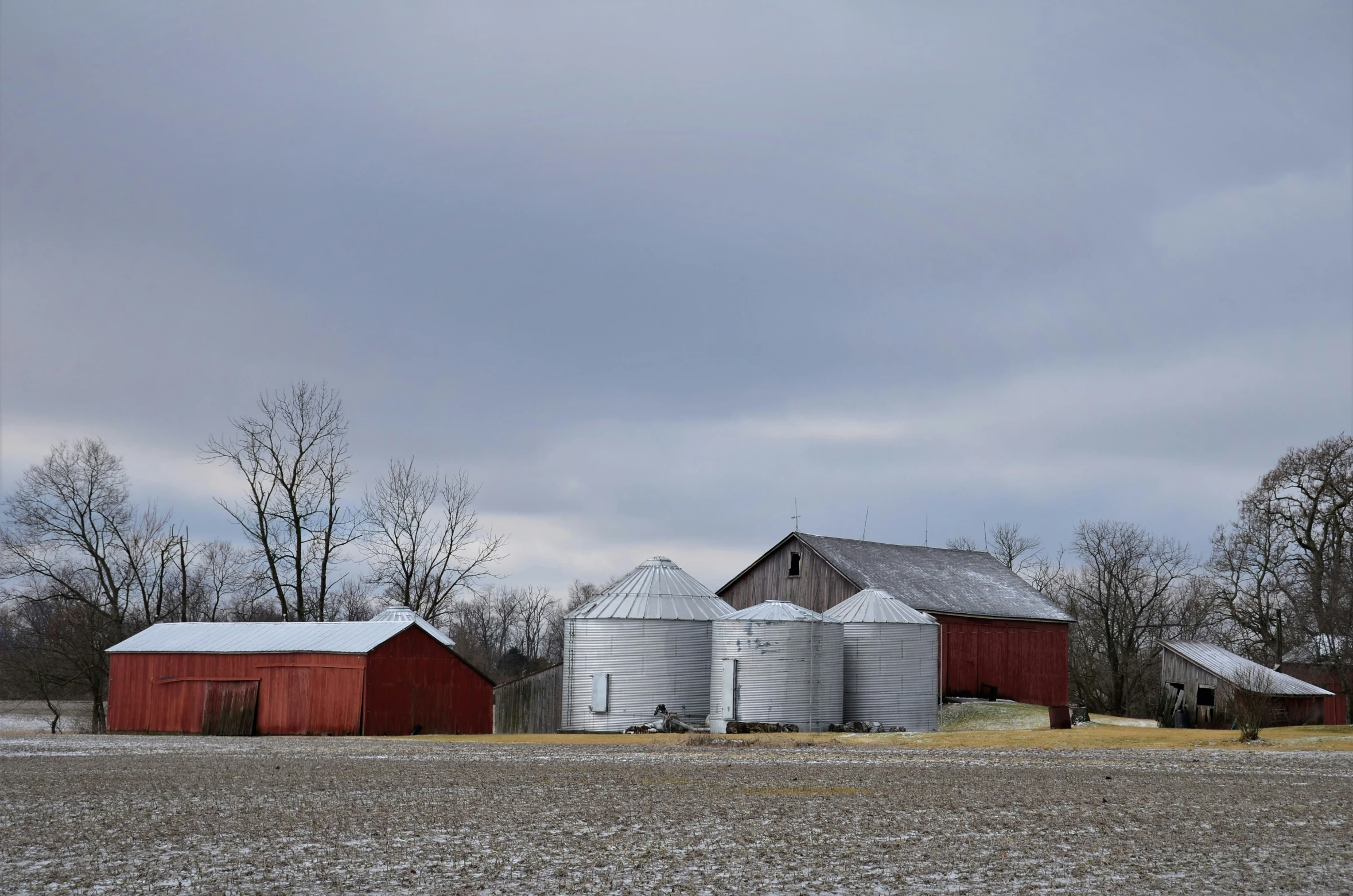 the barn, and other structures can be seen in this pograph