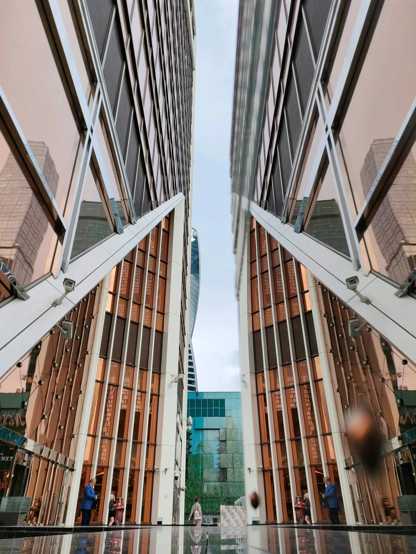 two buildings that look like they were taken through glass