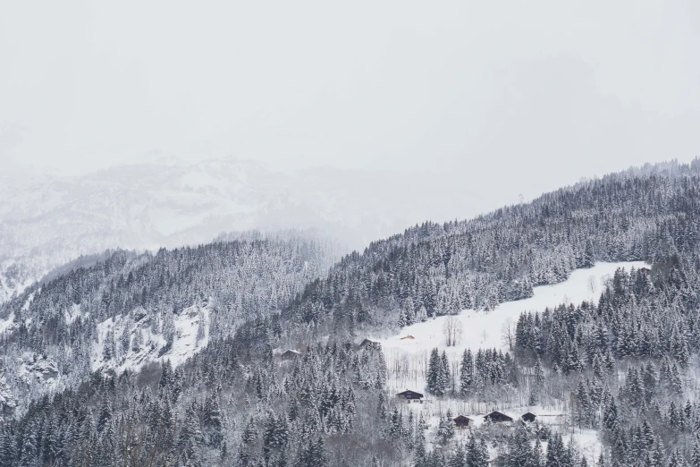 this is a view of some mountains covered in snow