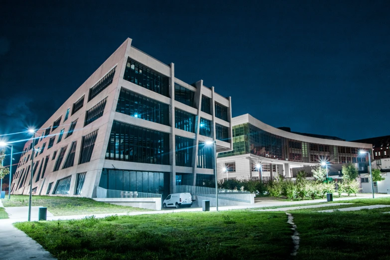 an industrial building with multiple levels of windows in the city